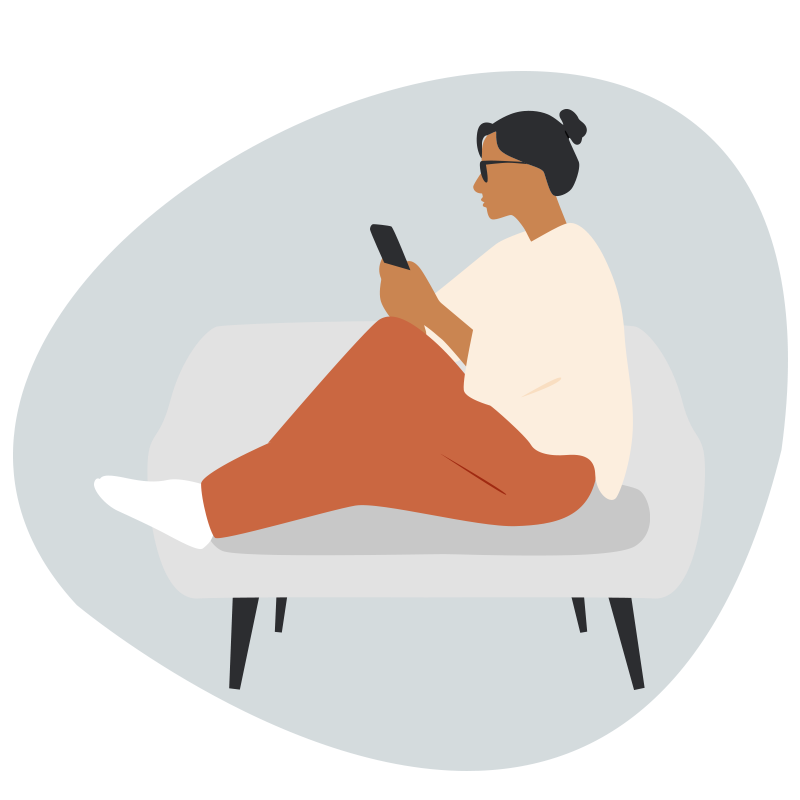Woman with cell phone on a couch