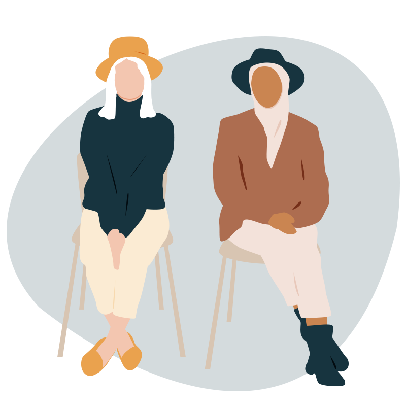 Two people sitting on chairs; therapy for trauma in the Bronx